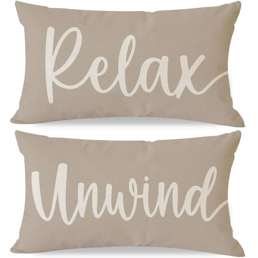 2 outdoor pillows one says relax one says unwind