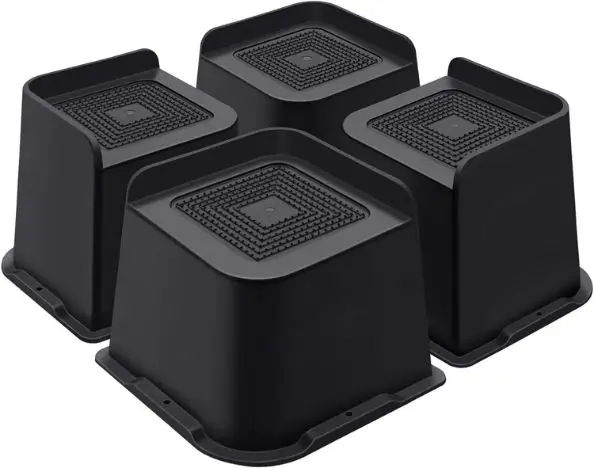 4 black furniture risers