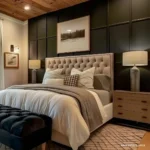 Bed with a nightstand and lamp on both sides in a bedroom designed for two people