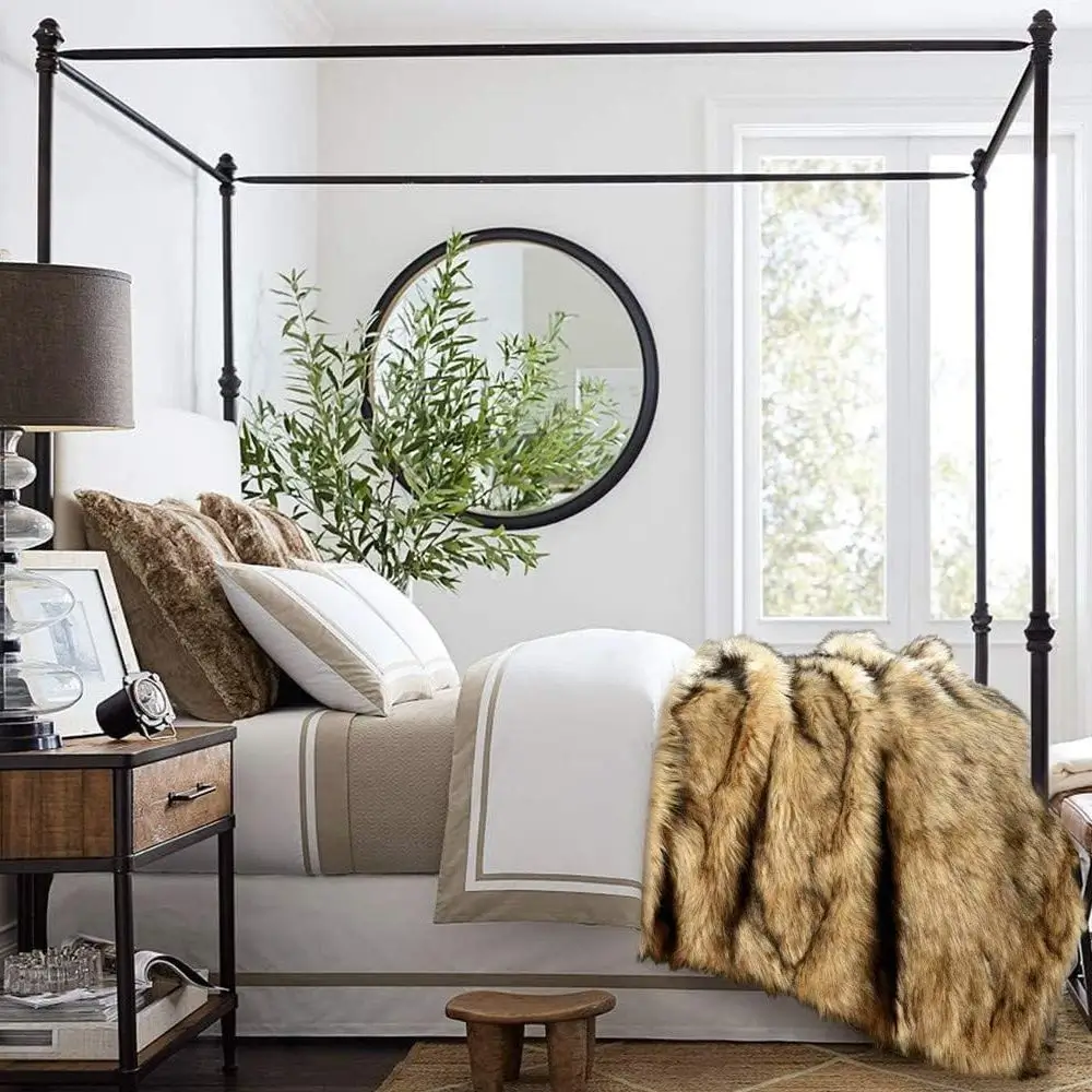 bed with faux fur blanket earth tone colors