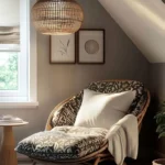 bedroom reading nook with chair and side table and lighting
