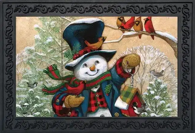 christmas doormat with snowman birds and pine trees with snow on them