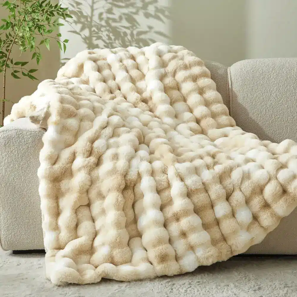 cozy faux fur throw blanket on a couch