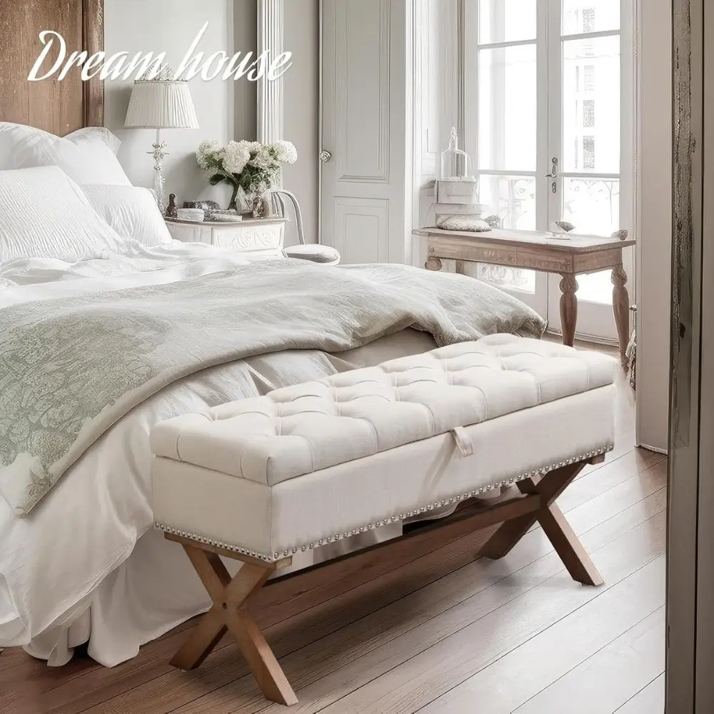 cream tufted bench end of bed