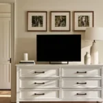 dresser across from bed in small bedroom