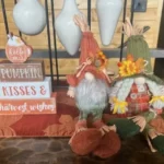 fall decorated console table with fall sign and fall gnomes