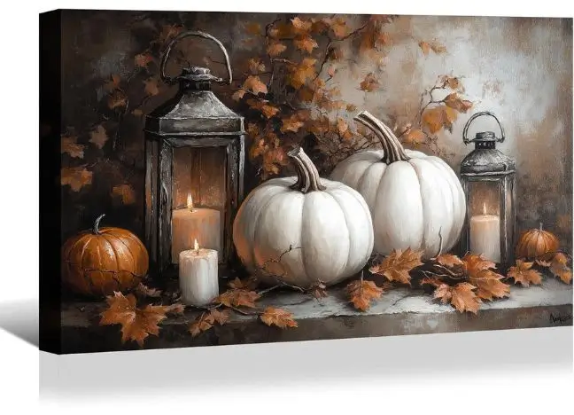 fall wall print with two white pumpkins small orange pumpkin candle and two lanterns with fall leaves