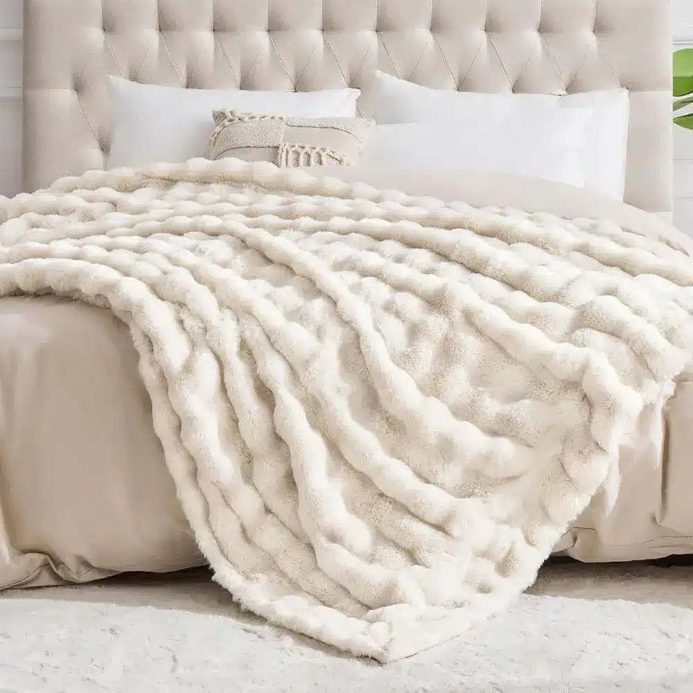 faux fur blanket on bed