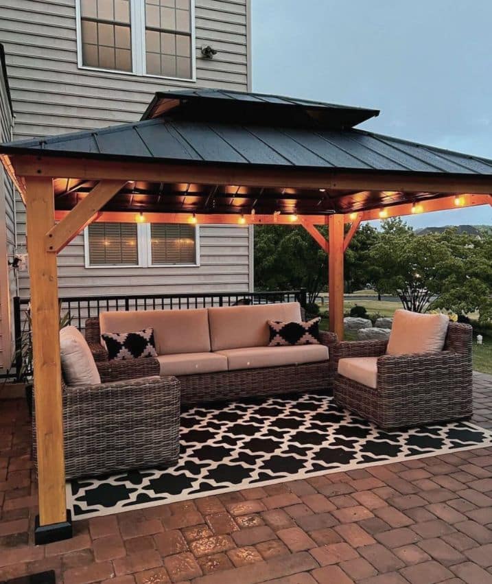 gazebo on backyard outside patio with string lights