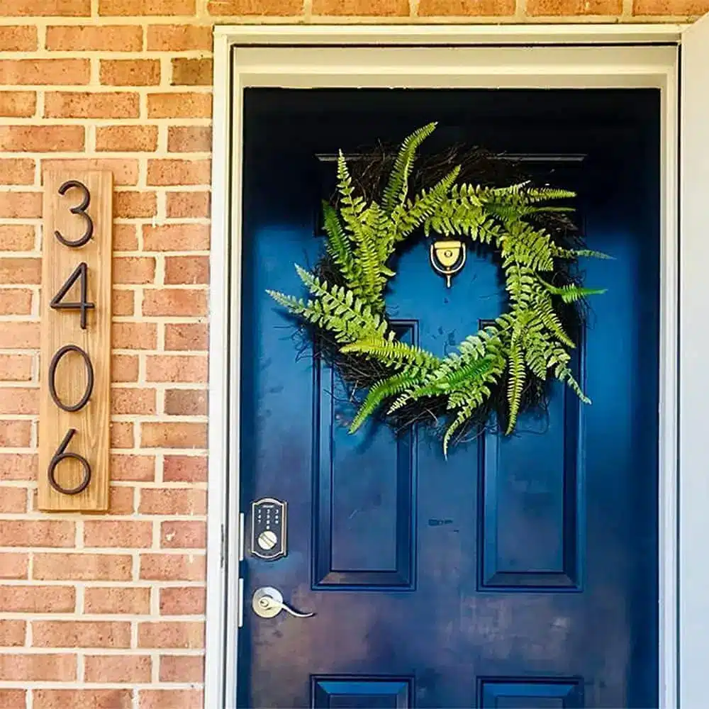 house number on outside of home next to door