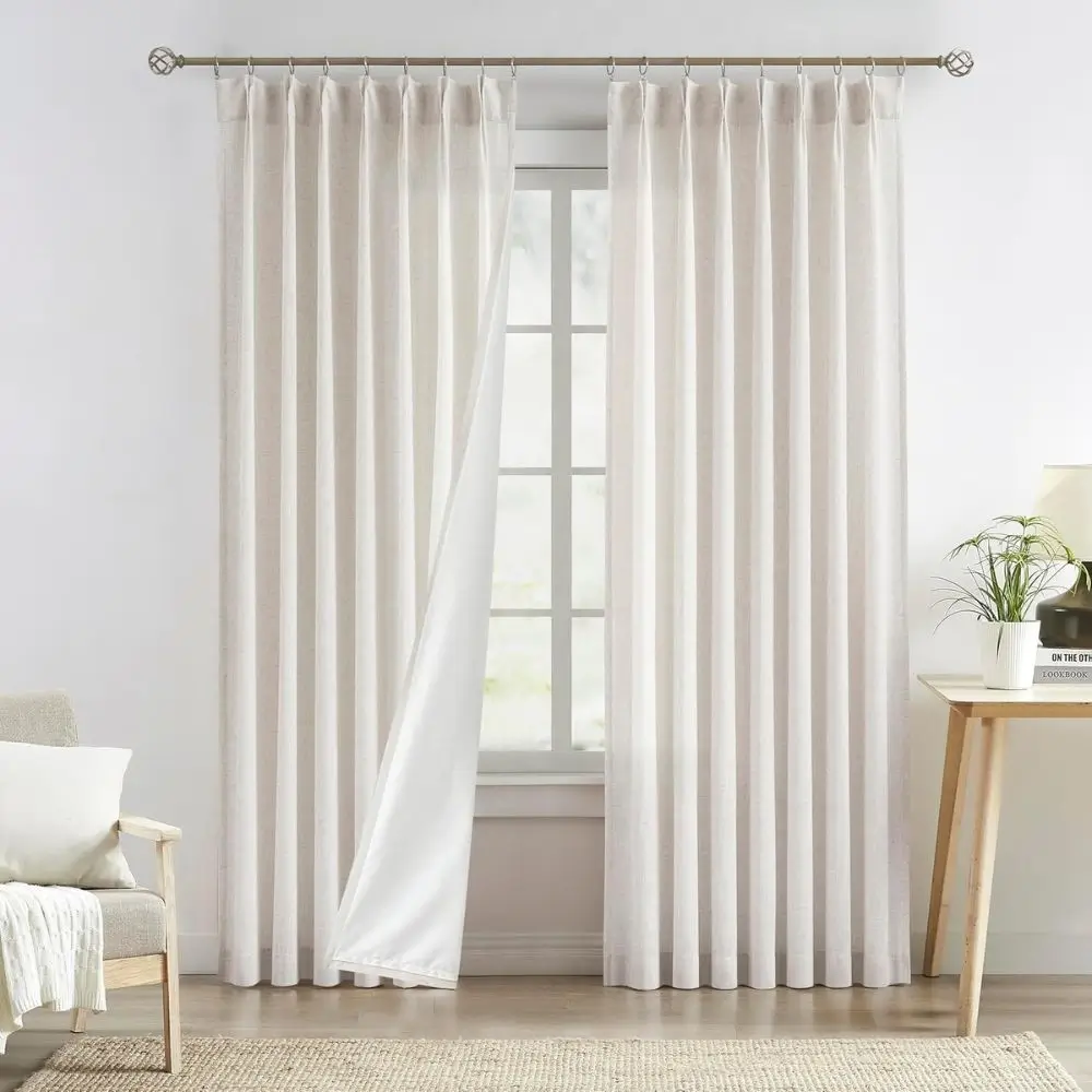 lined curtains hanging in home