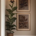 narrow hallway with two vertically framed artwork