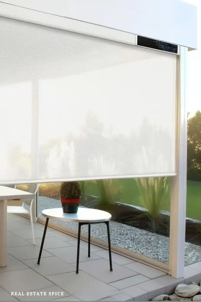 outdoor covered patio with motorized privacy shade