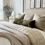 small bedroom with neutral colors 4 post bed