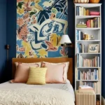 small bedroom with tall bookshelf