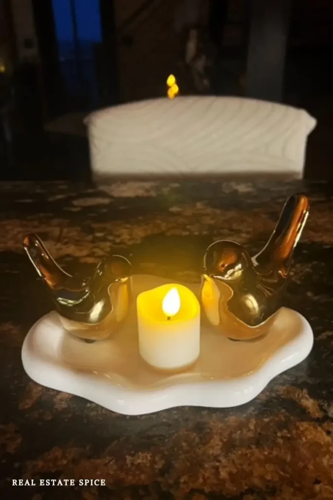 tea light statement display with decorative birds on a tray