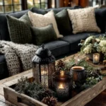 winter living room with tray with greenery pinecones and candles in it on coffee table