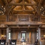 wood ceiling wood beams wood wall wood trim barndominium interior shows living room and loft